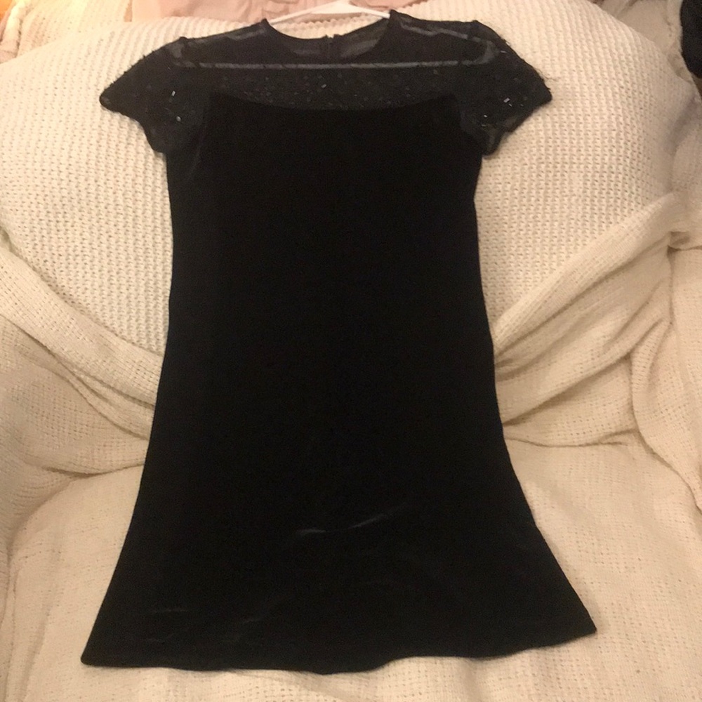 J.R.Nites petites by Caliendo this dress is super cute.Size is 4P.Color is black